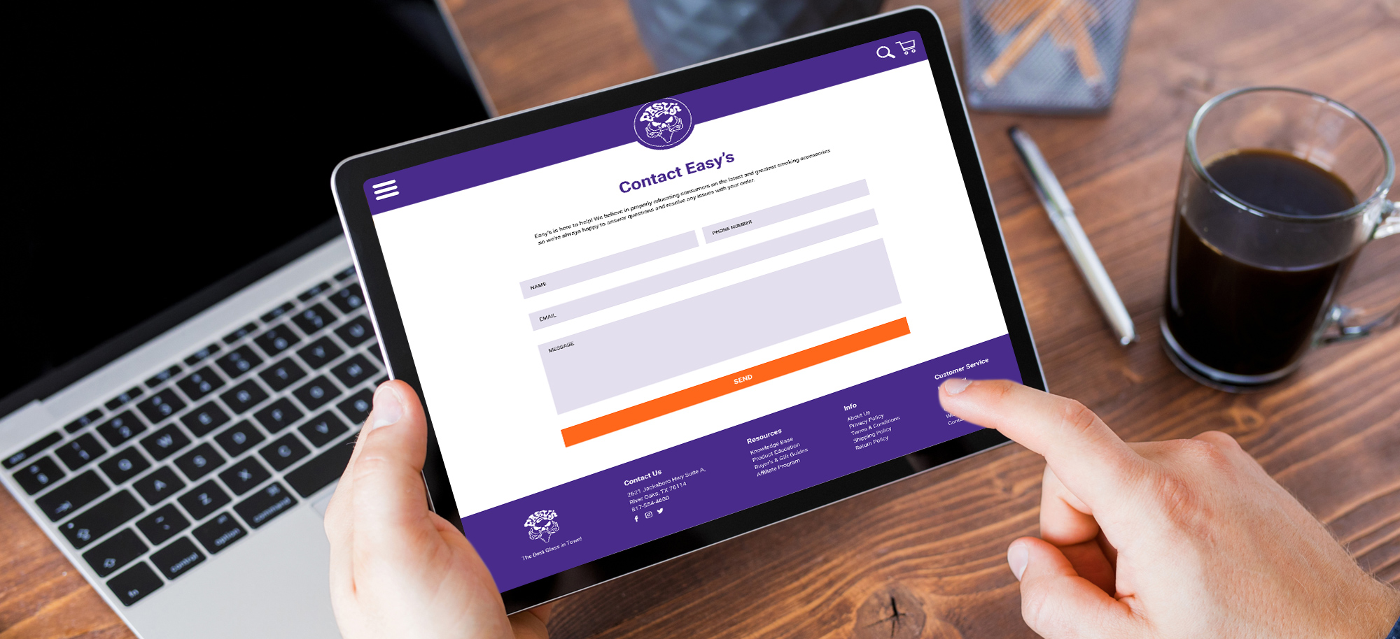 Hands holding a tablet displaying a clean contact form interface, part of a smoke shop digital marketing and branding case study user experience showcase. 